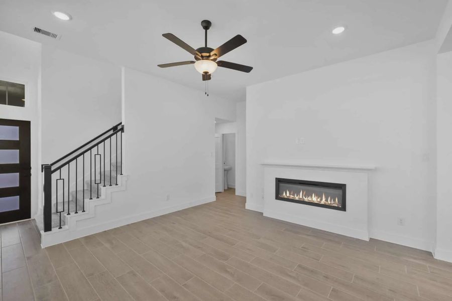 Representative unfurnished interior of a home built from the Versailles by Chesmar Homes in Meridiana Chateau, Manvel (Image 39).