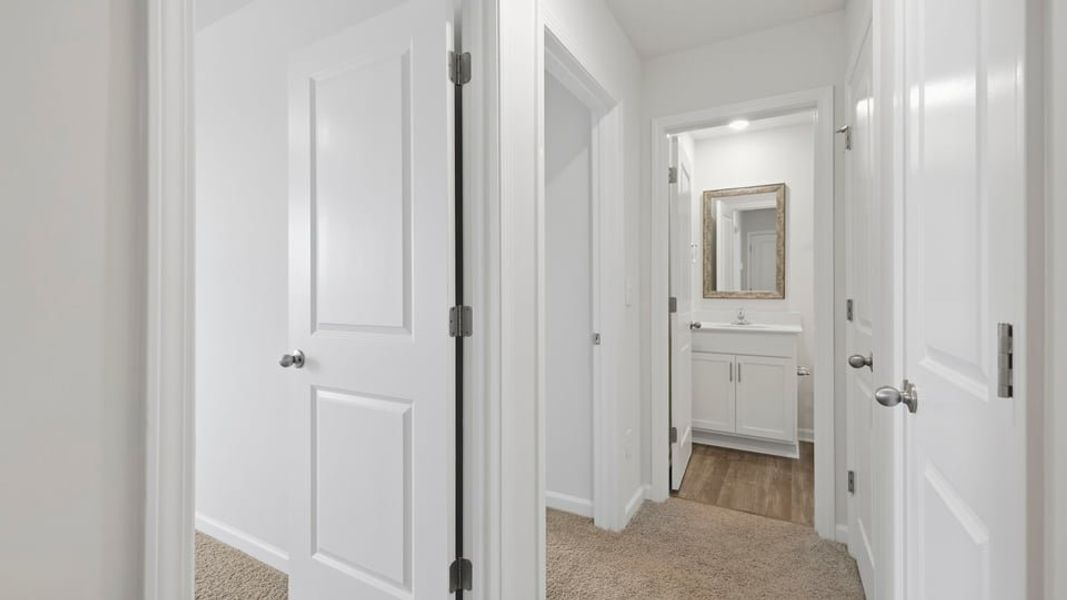 Spacious, unfurnished interior of a new home in Tanglewood Townes, Greenville (Image 22).