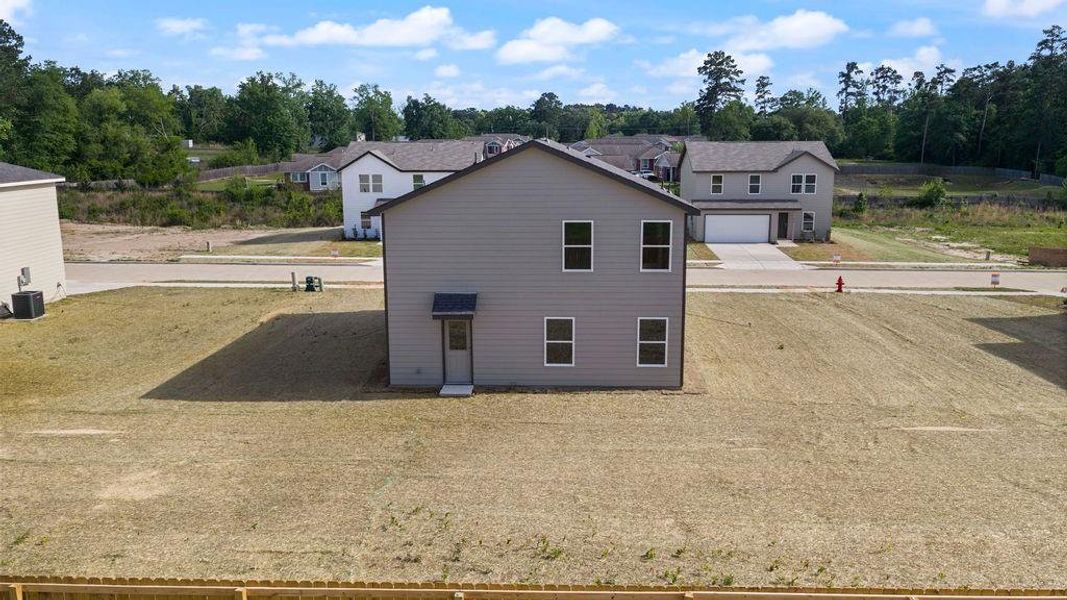Exterior details and patio area of a home in Stoney Ridge, Hudson (Image 3).