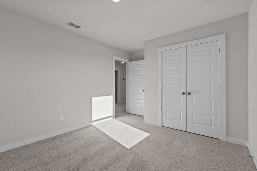 A room with white doors.