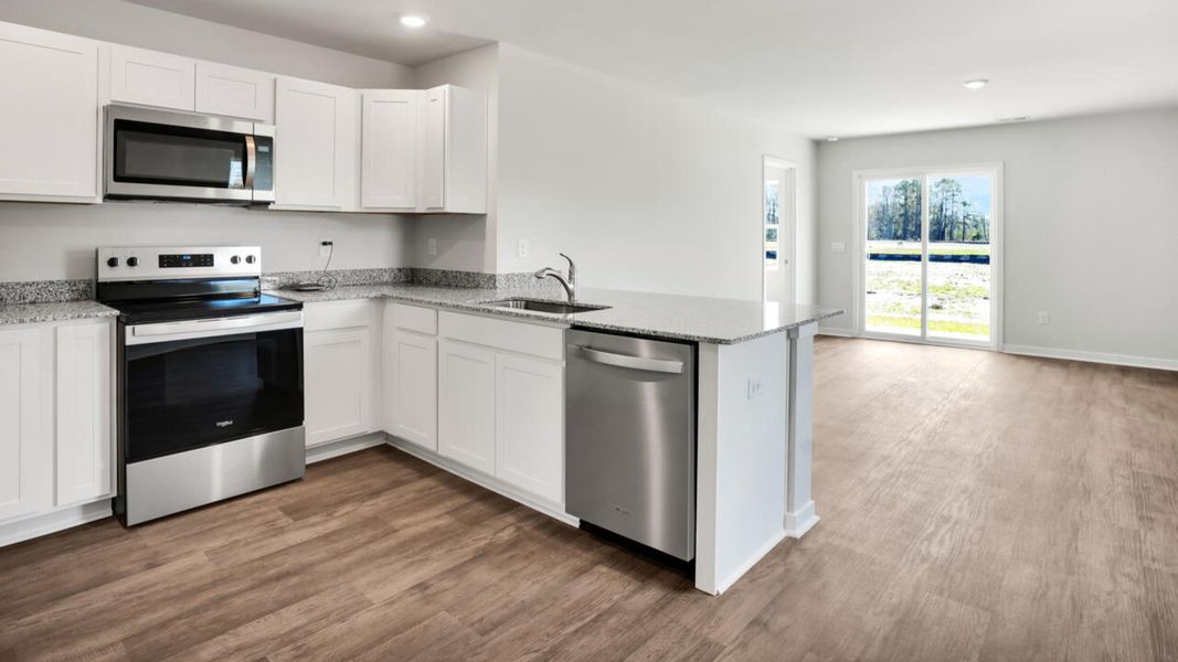 Furnished interior view inside a new home in Lockwood Landing, Supply (Image 6).