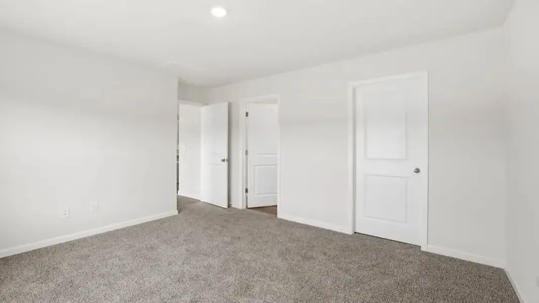 Spacious, unfurnished interior of a new home in Waverly Station, Greenwood (Image 32).