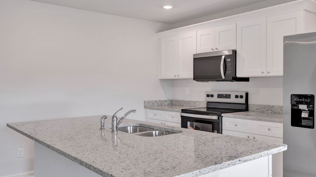 Furnished interior view inside a new home in Riggs Pointe, Millington (Image 8).