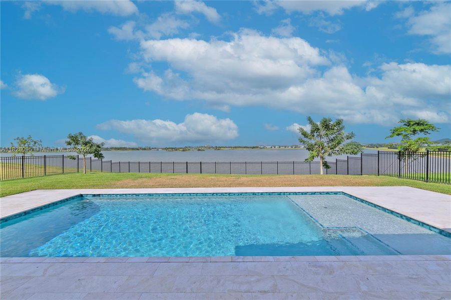 Exterior details and patio area of a home in Arden: The Waterford Collection, Loxahatchee (Image 4).