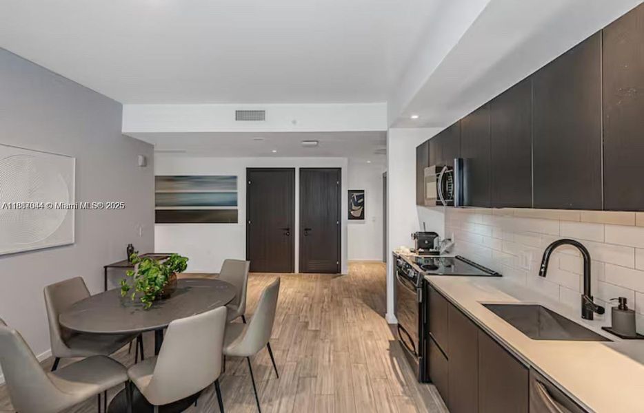 Furnished interior view inside a new home in , Miami (Image 7).