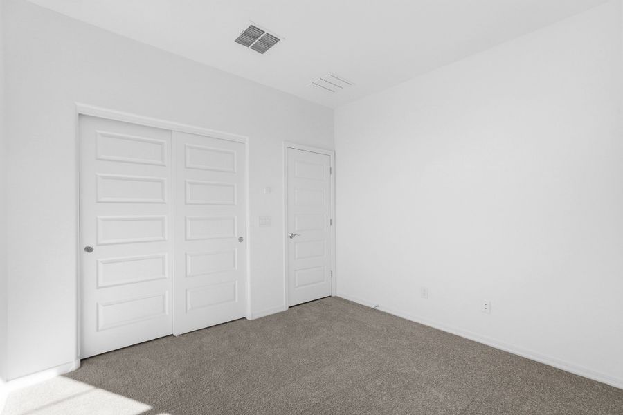 Spacious, unfurnished interior of a new home in Artisan at Asante, Surprise (Image 22).