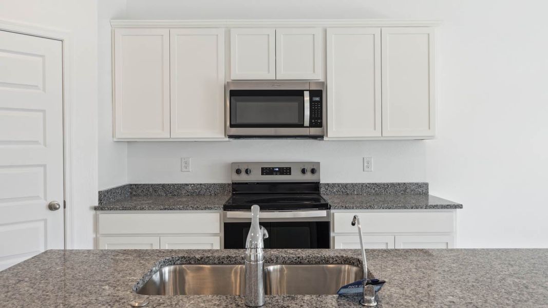 Representative furnished interior of a home built from the Mitchell by D.R. Horton in Upper Canyon, Phoenix (Image 7).
