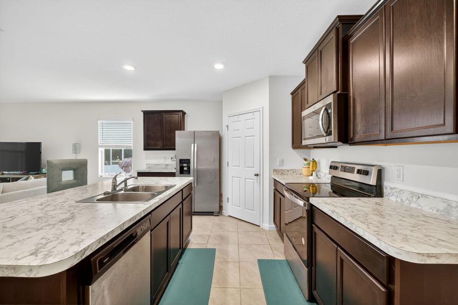 Furnished interior view inside a new home in , Port St. Lucie (Image 14).