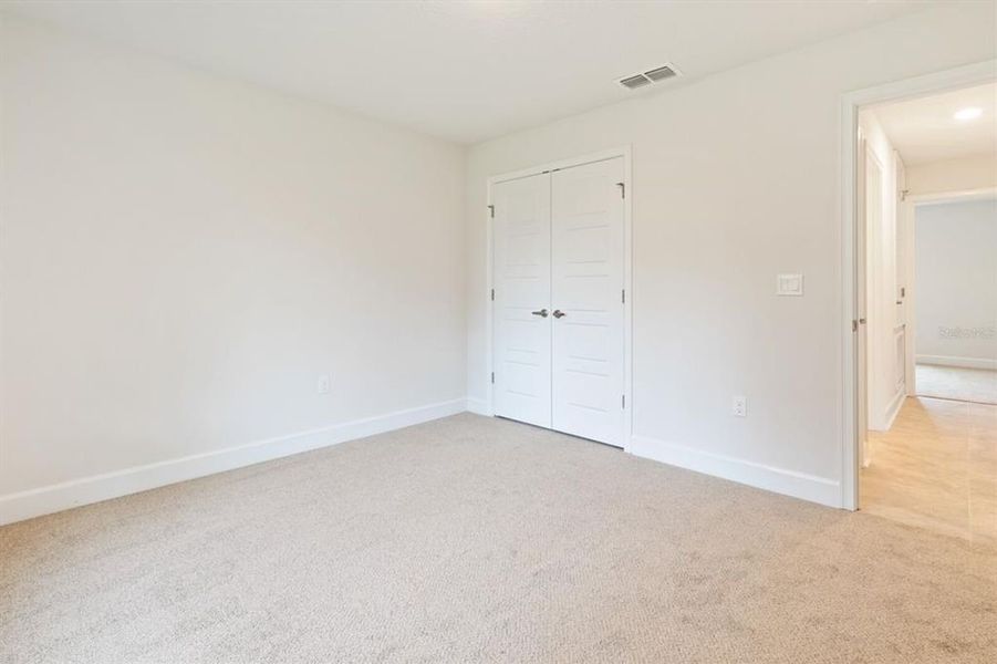 Representative unfurnished interior of a home built from the 1540 by Adams Homes in Okeechobee, Okeechobee (Image 22).
