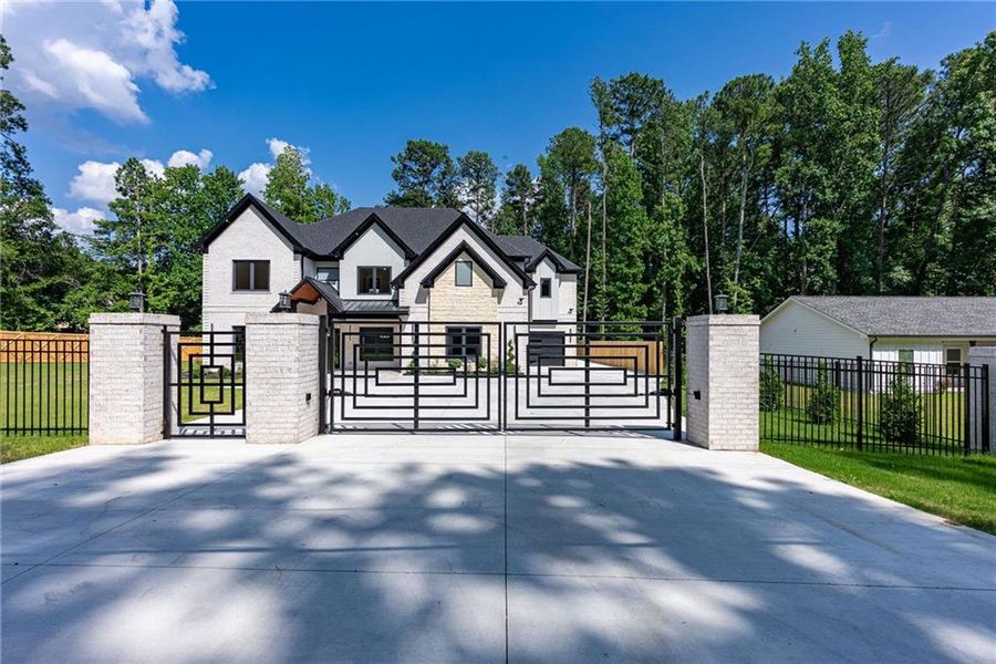 Front exterior of a new home in , Lawrenceville, GA, highlighting curb appeal (Image 43). Front exterior of a new home in , Lawrenceville, GA, highlighting curb appeal (Image 43).