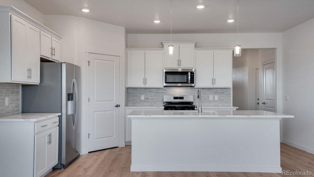 Furnished interior view inside a new home in Trails at Crowfoot, Parker (Image 10).