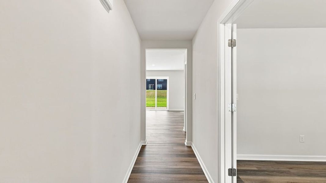 Spacious, unfurnished interior of a new home in Bentley Park, Greenwood (Image 13).