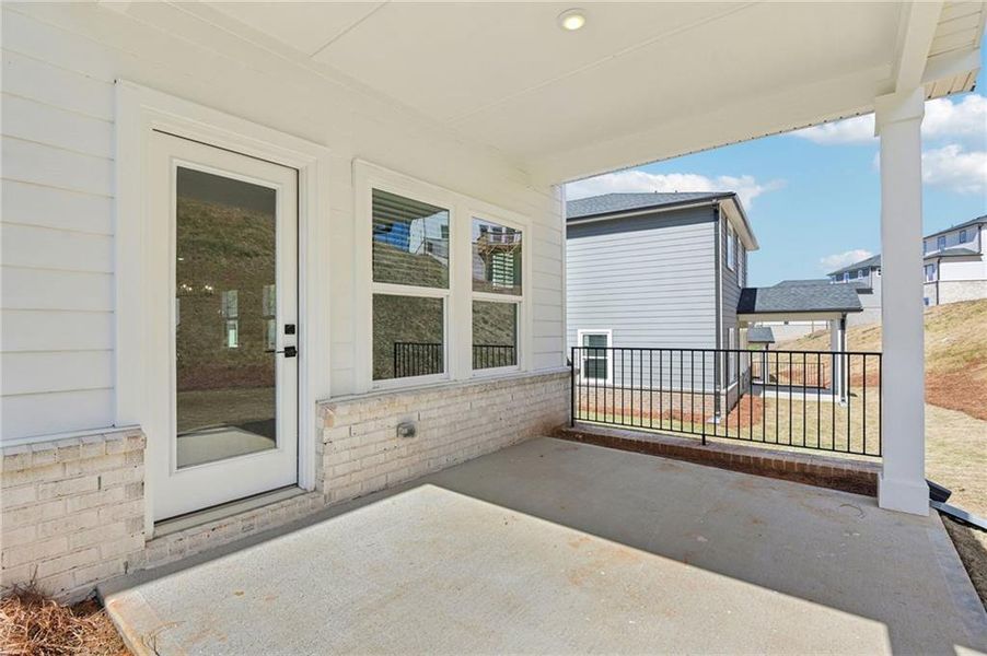 Exterior details and patio area of a home in Hemingway - Reserve Series, Cumming (Image 34).