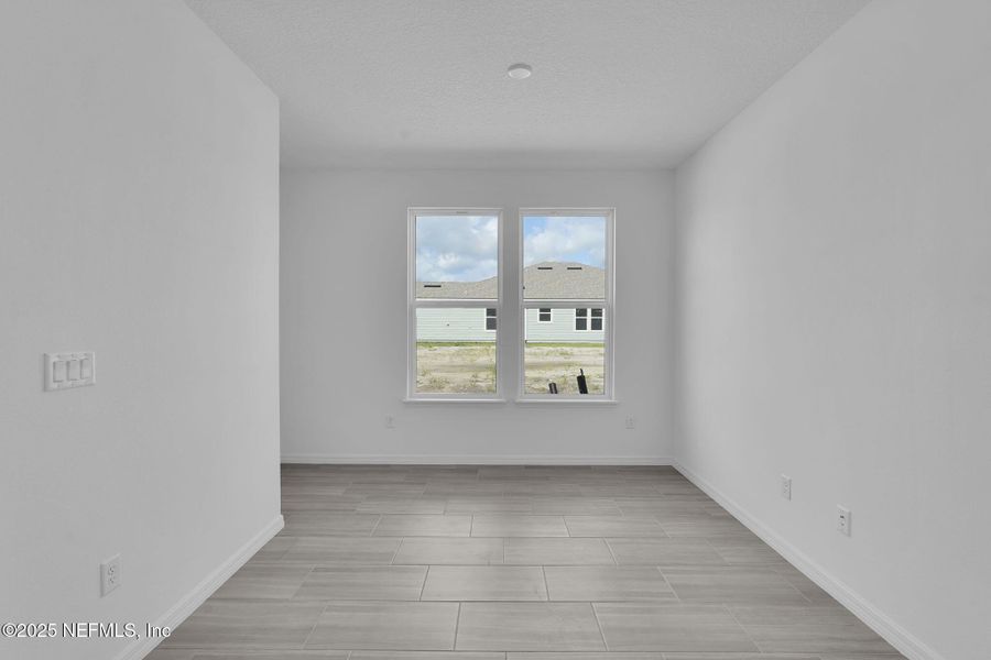 Spacious, unfurnished interior of a new home in Del Webb Wildlight, Yulee (Image 24).