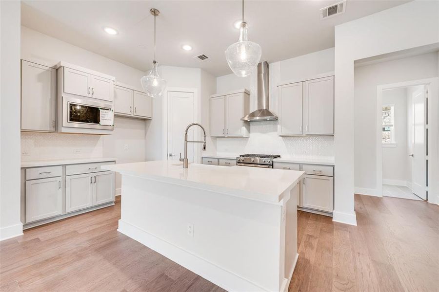 Furnished interior view inside a new home in Collin Creek, Plano (Image 10).