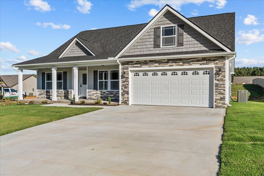 Representative exterior photo of a completed home built from the Whitney by Enchanted Homes in Ballentine Ridge, Lyman, SC (Image 2).