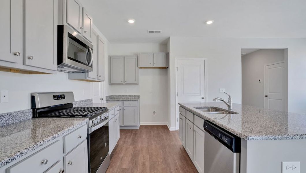 Representative furnished interior of a home built from the ROBIE by D.R. Horton in The Pines at Blake Farm, Wilmington (Image 4).