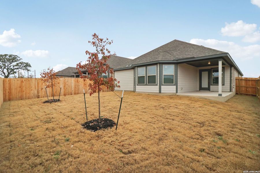 Exterior details and patio area of a home in Kallison Ranch, San Antonio (Image 25).