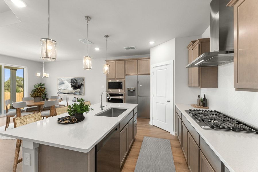 Representative furnished interior of a home built from the Valencia by Hakes Brothers in The Woodlands, Mico (Image 5).