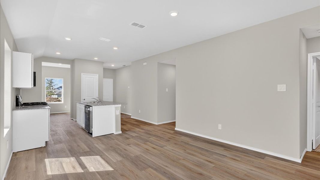 Representative unfurnished interior of a home built from the Abbot by D.R. Horton in Hickory Grove, Krum (Image 9).