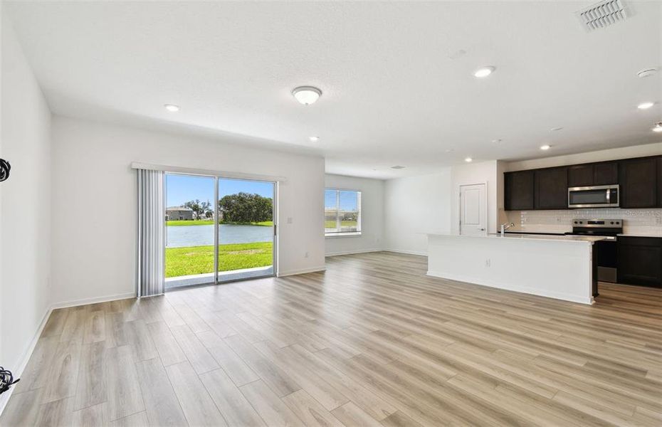 Spacious, unfurnished interior of a new home in Oakfield Lakes, Parrish (Image 15).