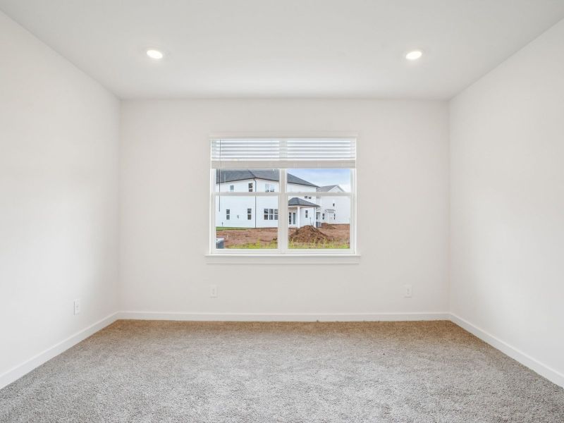 The primary suite offers a private retreat. The primary suite offers a private retreat.