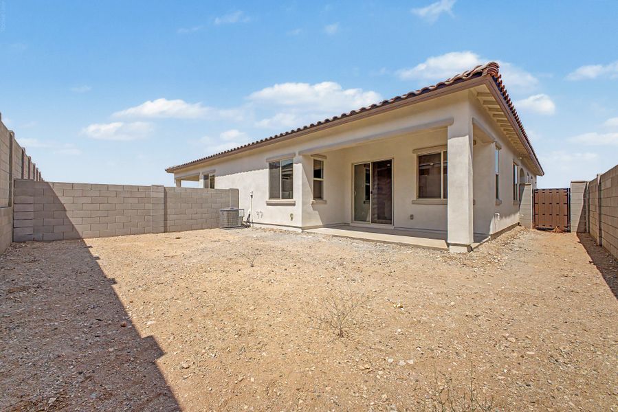 Exterior details and patio area of a home in Mira Vista at Victory, Buckeye (Image 3). Exterior details and patio area of a home in Mira Vista at Victory, Buckeye (Image 3).