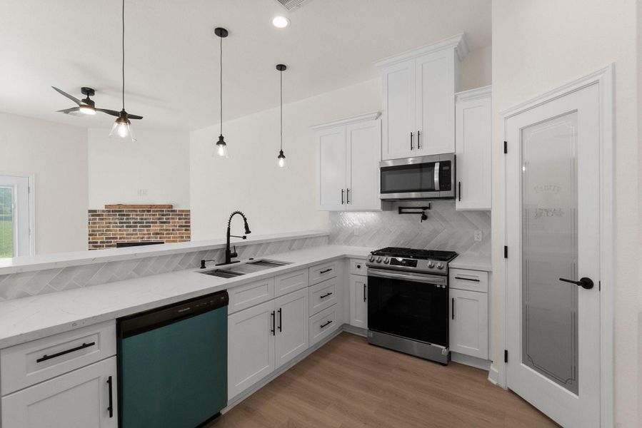 Furnished interior view inside a new home in , Willis (Image 9).