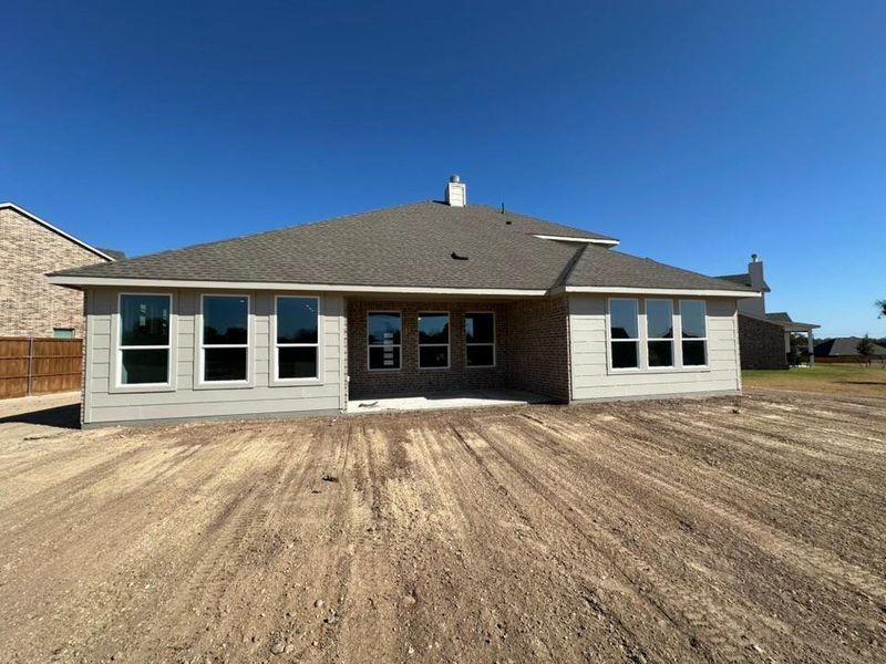 Exterior details and patio area of a home in Covenant Springs, Springtown (Image 3).