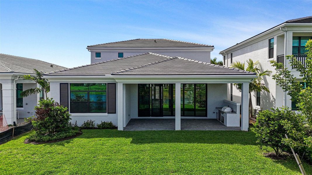 Exterior details and patio area of a home in , Palm Beach Gardens (Image 33).