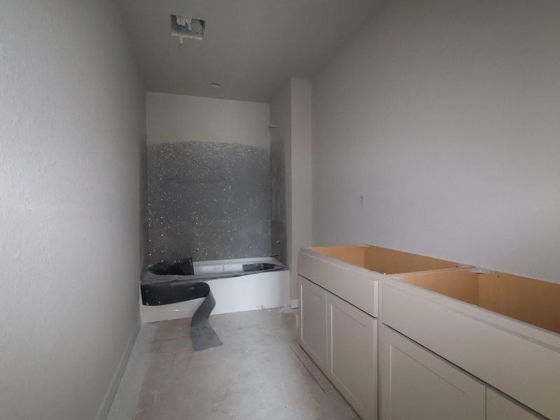 In-progress construction of a new home in Cascades at Onion Creek, Austin, TX (Image 6).