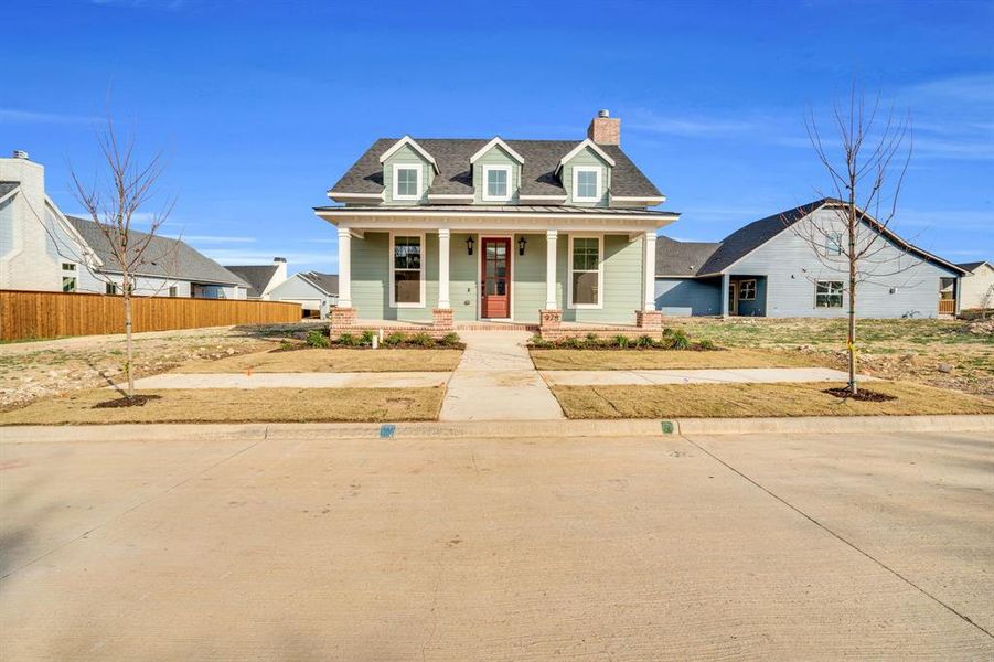 Front exterior of a new home in , Midlothian, TX, highlighting curb appeal (Image 2).