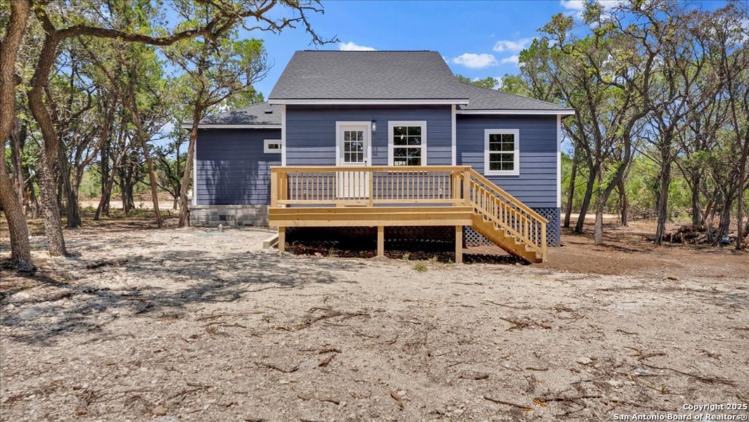 Front exterior of a new home in , Bandera, TX, highlighting curb appeal (Image 24). Front exterior of a new home in , Bandera, TX, highlighting curb appeal (Image 24).