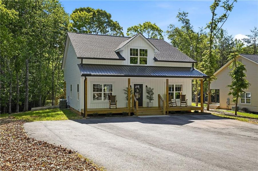 Front exterior of a new home in , Cleveland, GA, highlighting curb appeal (Image 1). Front exterior of a new home in , Cleveland, GA, highlighting curb appeal (Image 1).