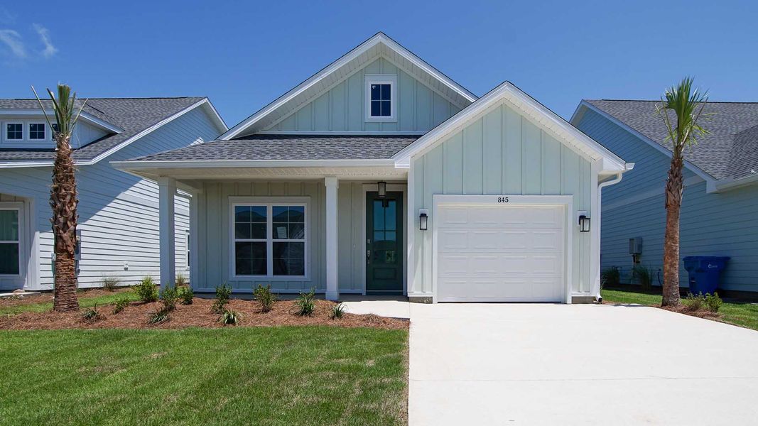 Representative exterior photo of a completed home built from the Bluewater by D.R. Horton in Breakfast Point East Phase I, Panama City Beach, FL (Image 24).