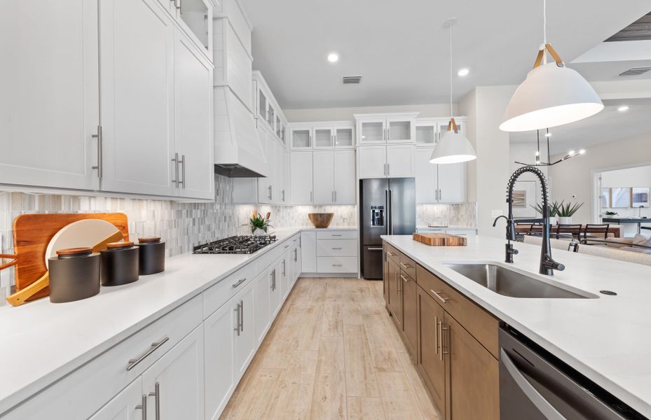 Representative furnished interior of a home built from the Layton by DiVosta in Terreno, Naples (Image 27).