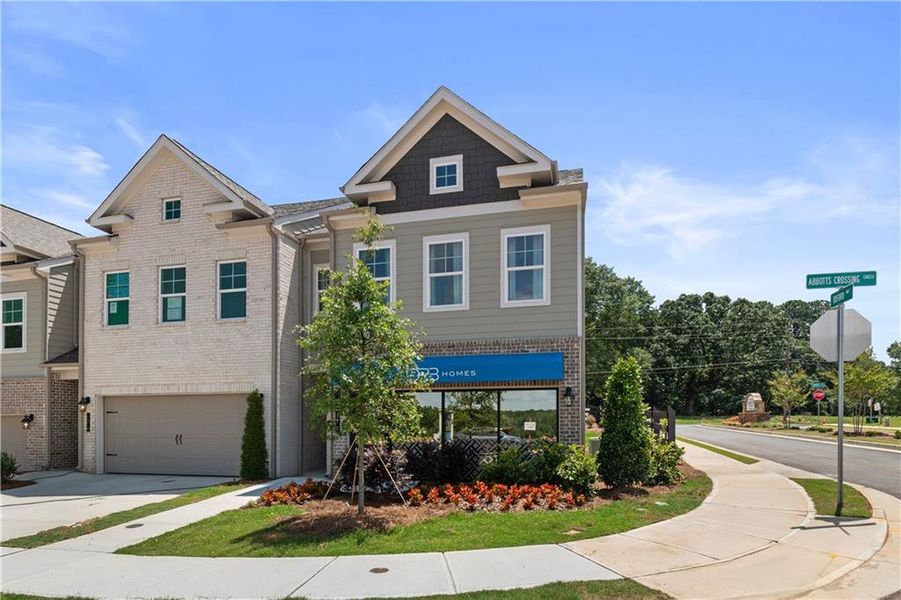 Front exterior of a new home in Abbotts Crossing, Conyers, GA, highlighting curb appeal (Image 23).
