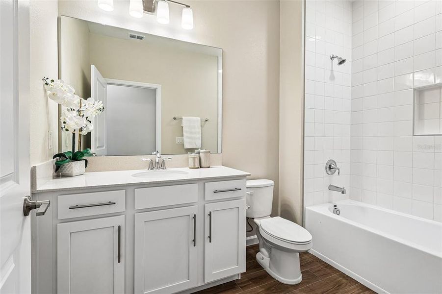 Furnished interior view inside a new home in Center Lake on the Park, St. Cloud (Image 6).