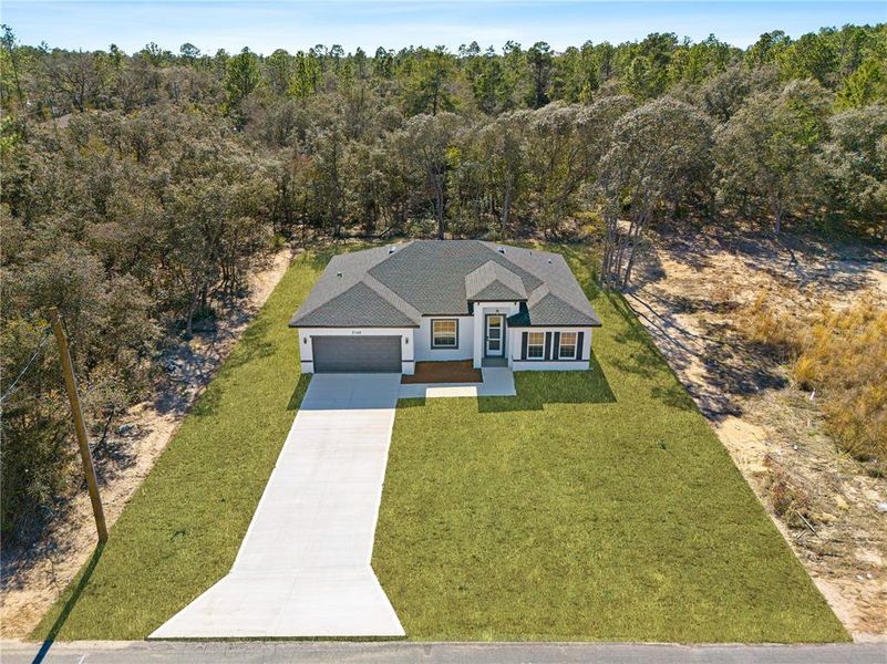 Front exterior of a new home in , Citrus Springs, FL, highlighting curb appeal (Image 20).