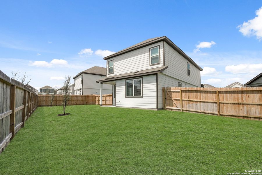 Exterior details and patio area of a home in Melissa Ranch, San Antonio (Image 3). Exterior details and patio area of a home in Melissa Ranch, San Antonio (Image 3).