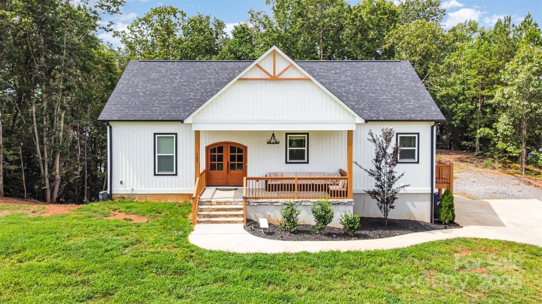 Front exterior of a new home in , Stony Point, NC, highlighting curb appeal (Image 21).