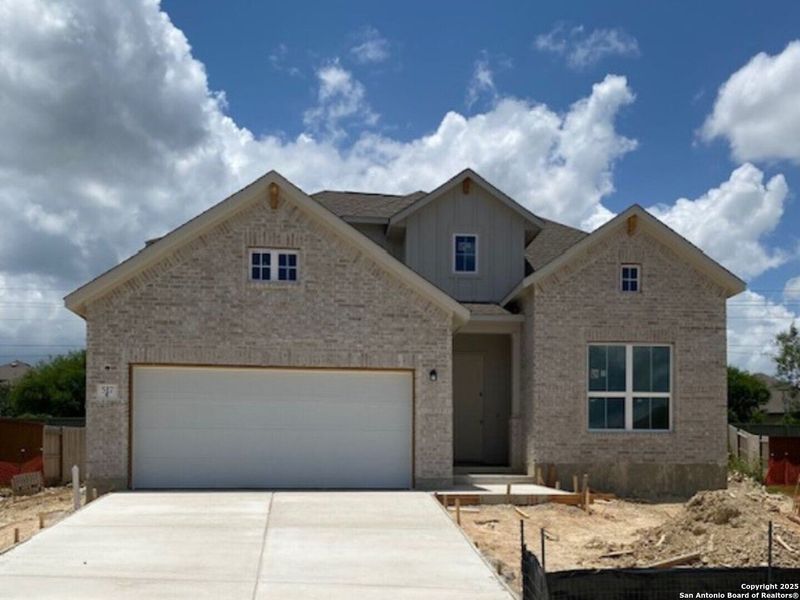 Front exterior of a new home in Foxbrook, Cibolo, TX, highlighting curb appeal (Image 19).