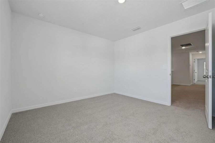 Spacious, unfurnished interior of a new home in Bradford Park, Ormond Beach (Image 28).