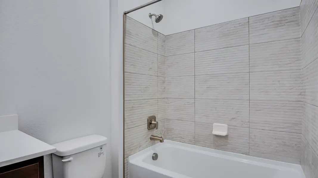 Furnished interior view inside a new home in Trails at Crowfoot, Parker (Image 15).