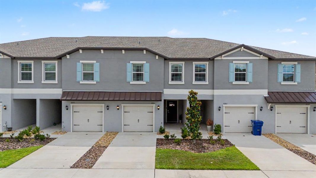 Front exterior of a new home in , San Antonio, FL, highlighting curb appeal (Image 29).