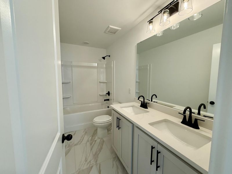 Furnished interior view inside a new home in , Summerville (Image 9).