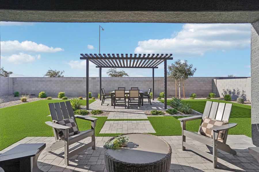 Covered patio to backyard with full landscaping Covered patio to backyard with full landscaping