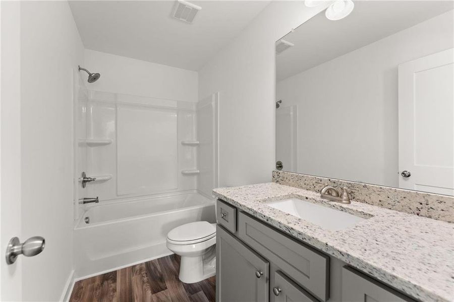 Furnished interior view inside a new home in Ellington Farms, Statham (Image 33).