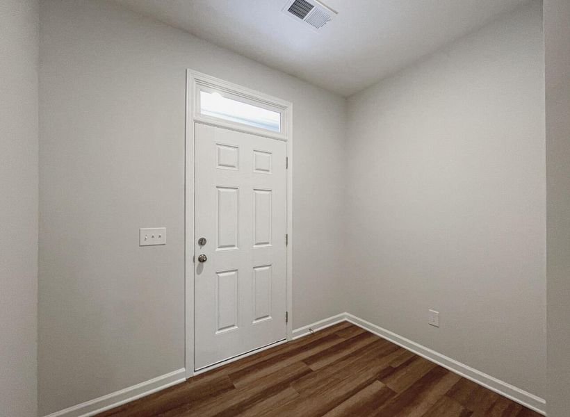 Spacious, unfurnished interior of a new home in East Main Townes, Spartanburg (Image 13).