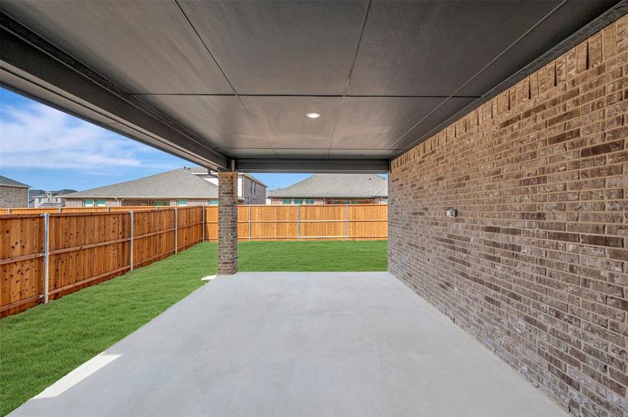Exterior details and patio area of a home in Gateway Parks, Forney (Image 22).